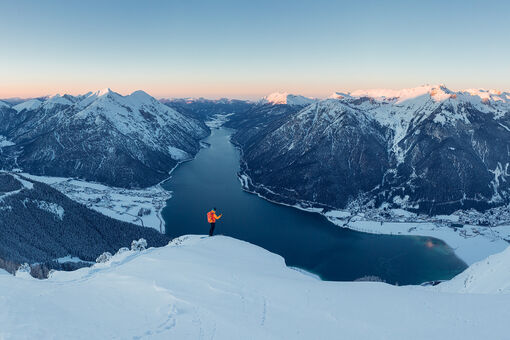 Ski tourers can explore the wintry scenery at Lake Achensee.